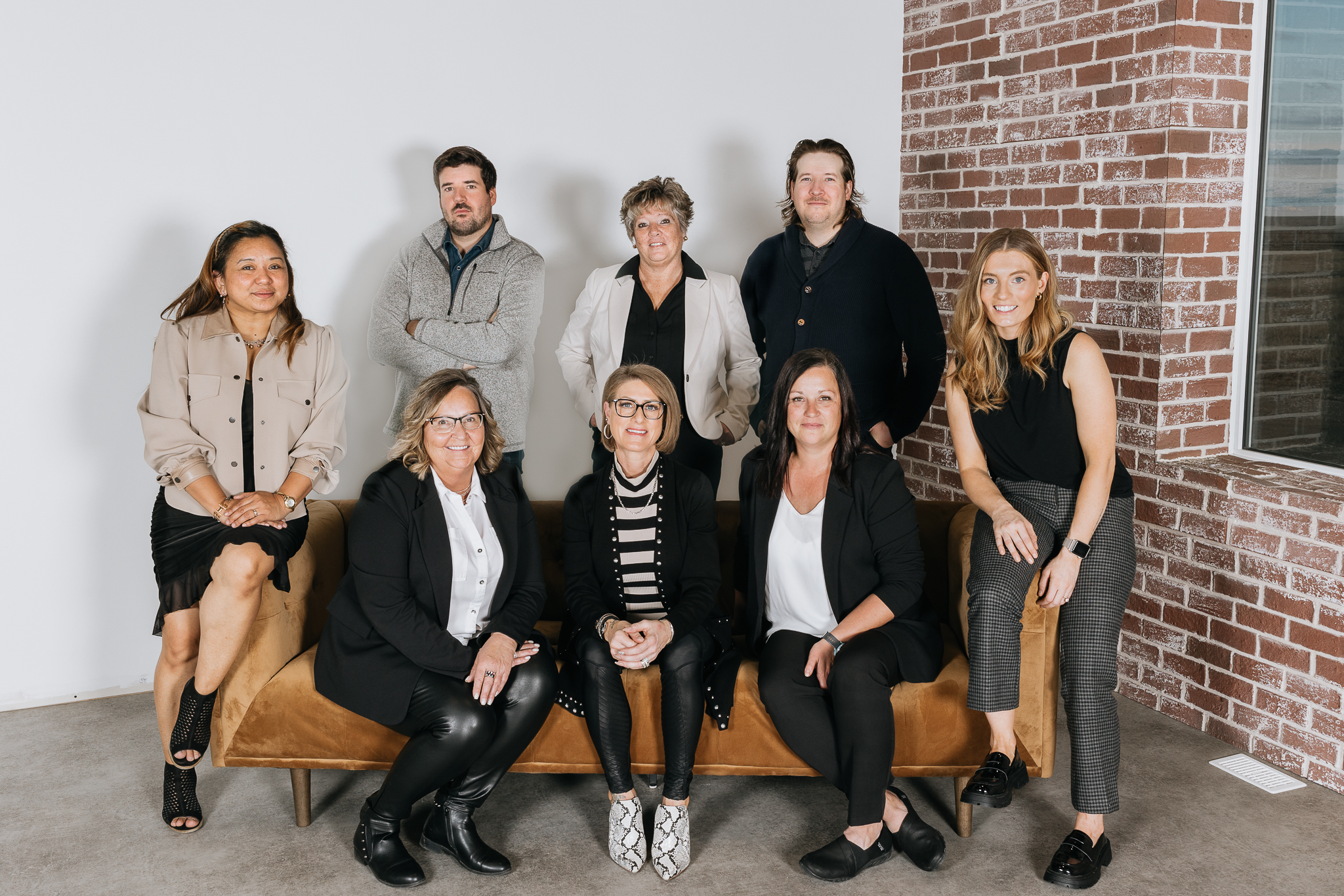 Snap front of the office with team members